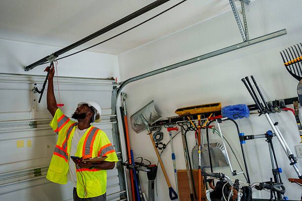 Professional Garage Door Panel Replacement technician working in One Loudoun, VA